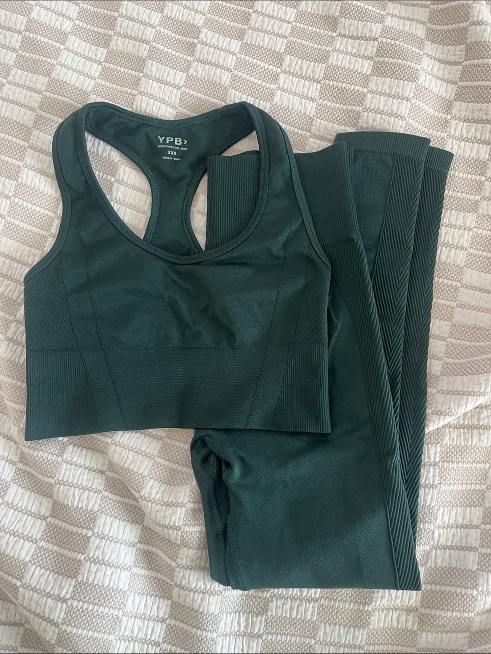 YPB workout set in dark green